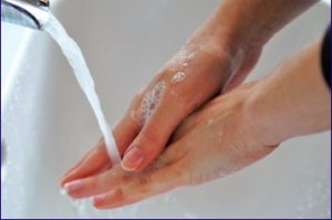picture of someone washing their hands